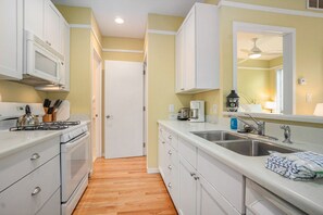 Dishwasher, coffee/tea maker, cookware/dishes/utensils