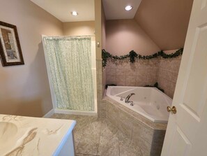 Combined shower/tub, jetted tub, hair dryer, soap