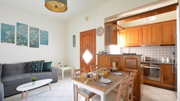 Apartamento conforto | Área de estar | Smart TV