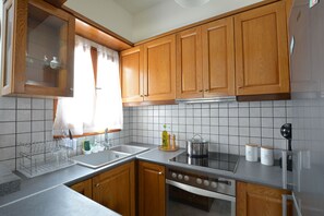 Comfort-Apartment | Eigene Küche | Kühlschrank, Wasserkocher, Hochstuhl, Esstisch