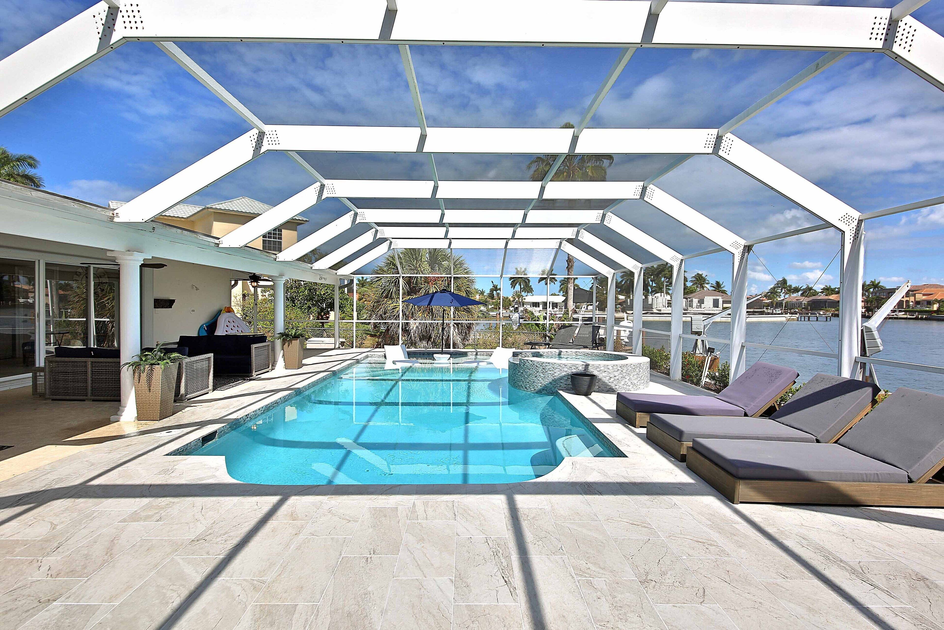 A heated pool, pool umbrellas