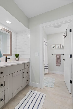 Combined shower/bathtub, hair dryer, towels - Peaceful Condo – Cedars East #803 by RVA (Longboat Key)