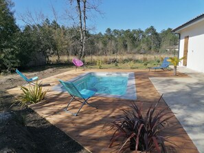 Alberca al aire libre y alberca climatizada