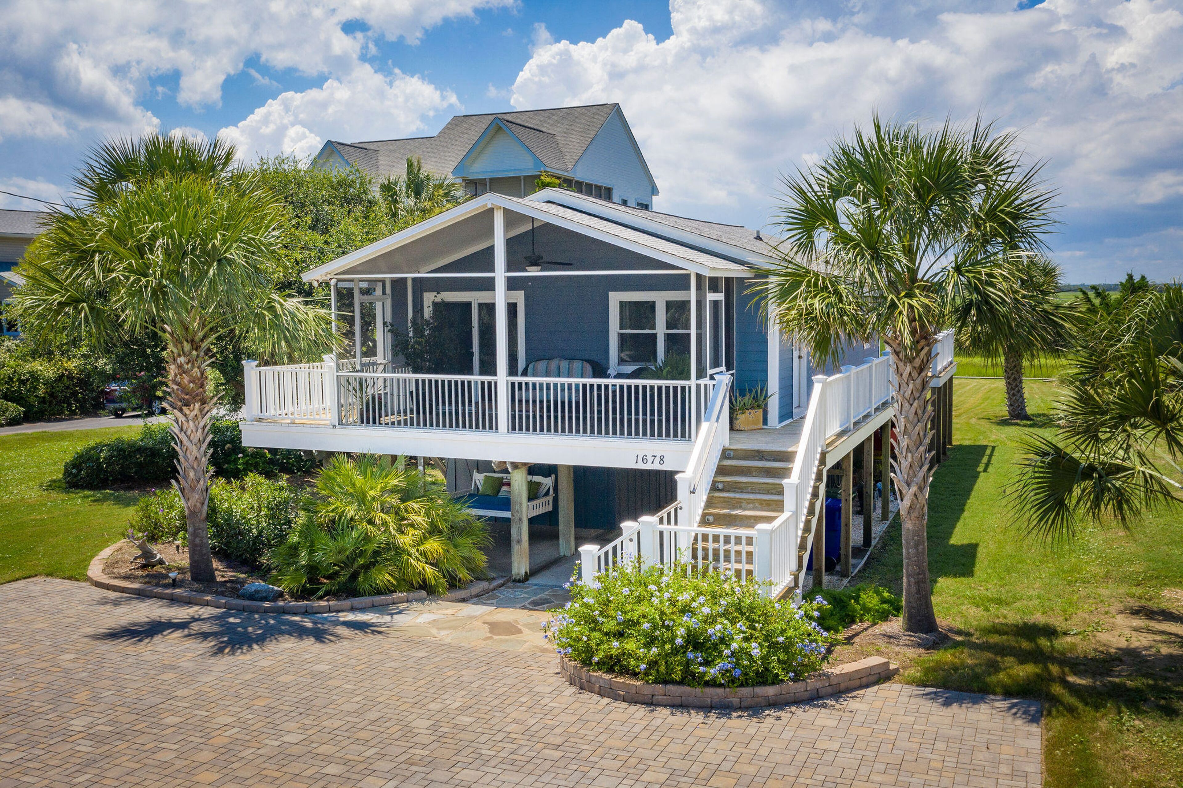 Dreamy Island Home w/ Two Screened Decks, Firepit, Fast WiFi, & Beach Access
