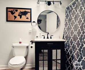 Combined shower/tub, hair dryer, towels, soap