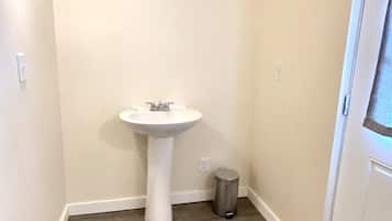 Bathtub, towels, shampoo