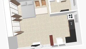 A kitchen with a stove, sink, and counter space. There is a dining area with a table and chairs. - Studio Paradis Caché Sainte-Marie Kybo Karaib Location pkg Mtgne (Sainte-Marie)