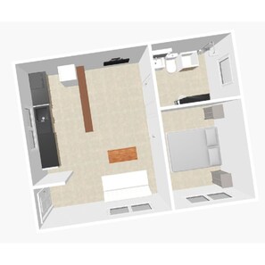 Un appartement comprenant deux chambres, une cuisine, un coin repas et deux salles de bain.