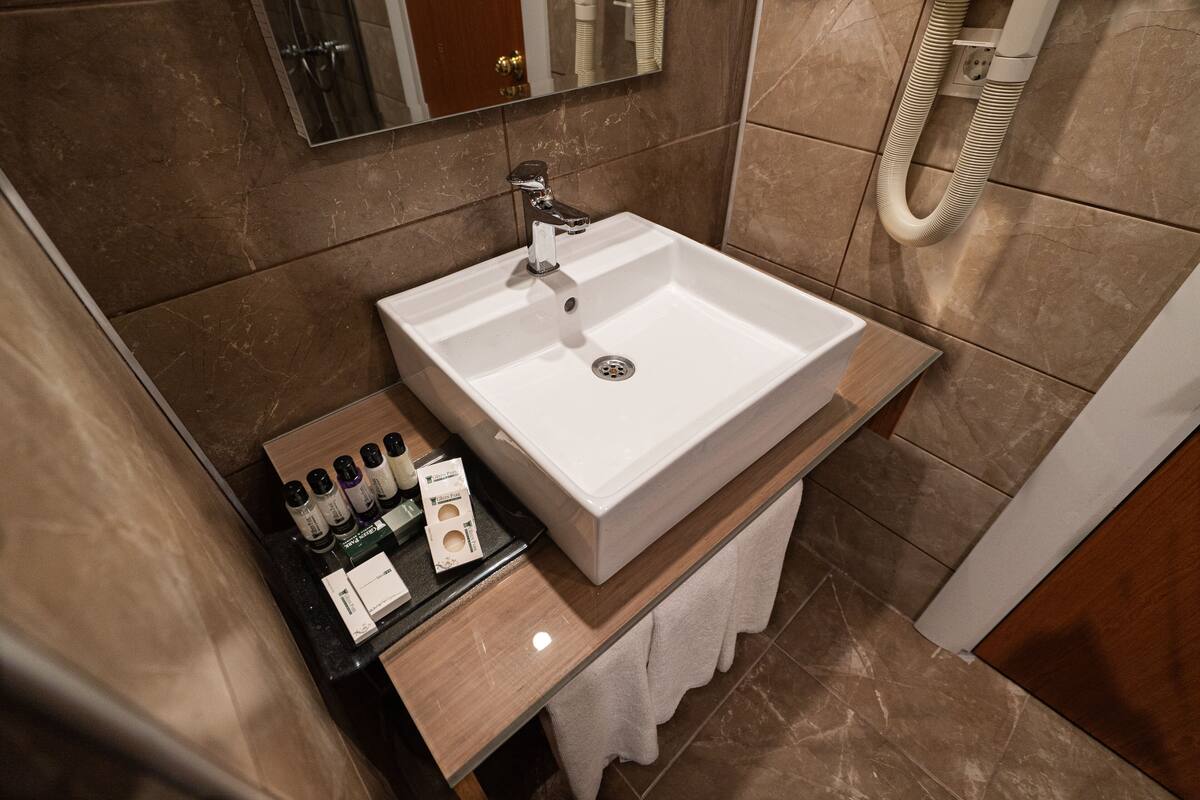 bathtub, free toiletries, hair dryer, bathrobes