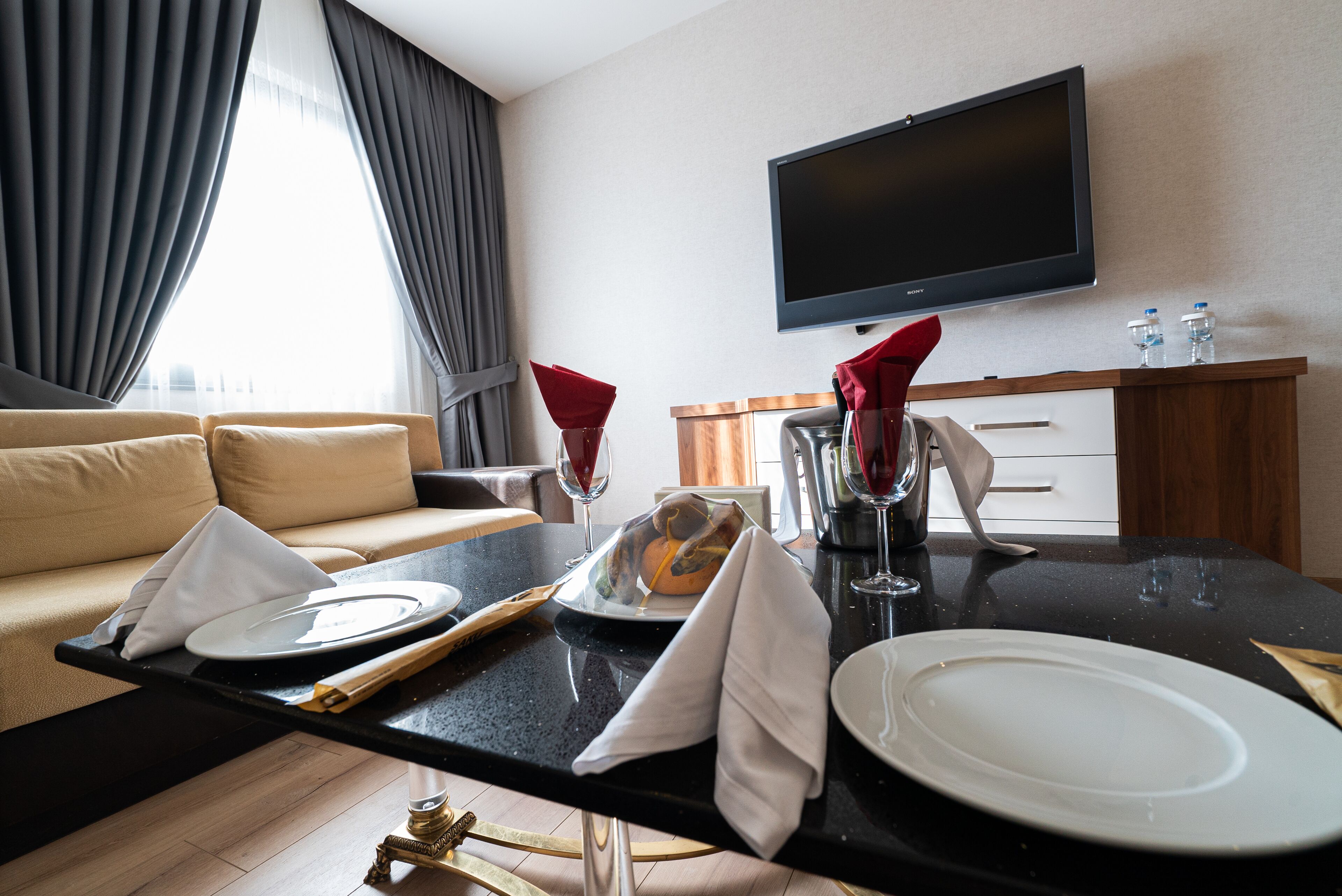 Presidential Suite | Living area | 49-inch LED TV with premium TV channels, TV