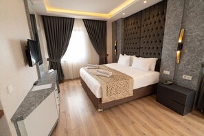 Presidential-sviitti | Minibaari, tallelokero huoneessa, ilmainen Wi-Fi, vuodevaatteet