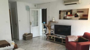Living area - "Air-Conditioned Apartment with Pool Access for 6, Terrace, and Parking - Agde, France" (Cap d'Agde)