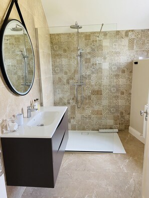 Shower, hair dryer, towels, soap