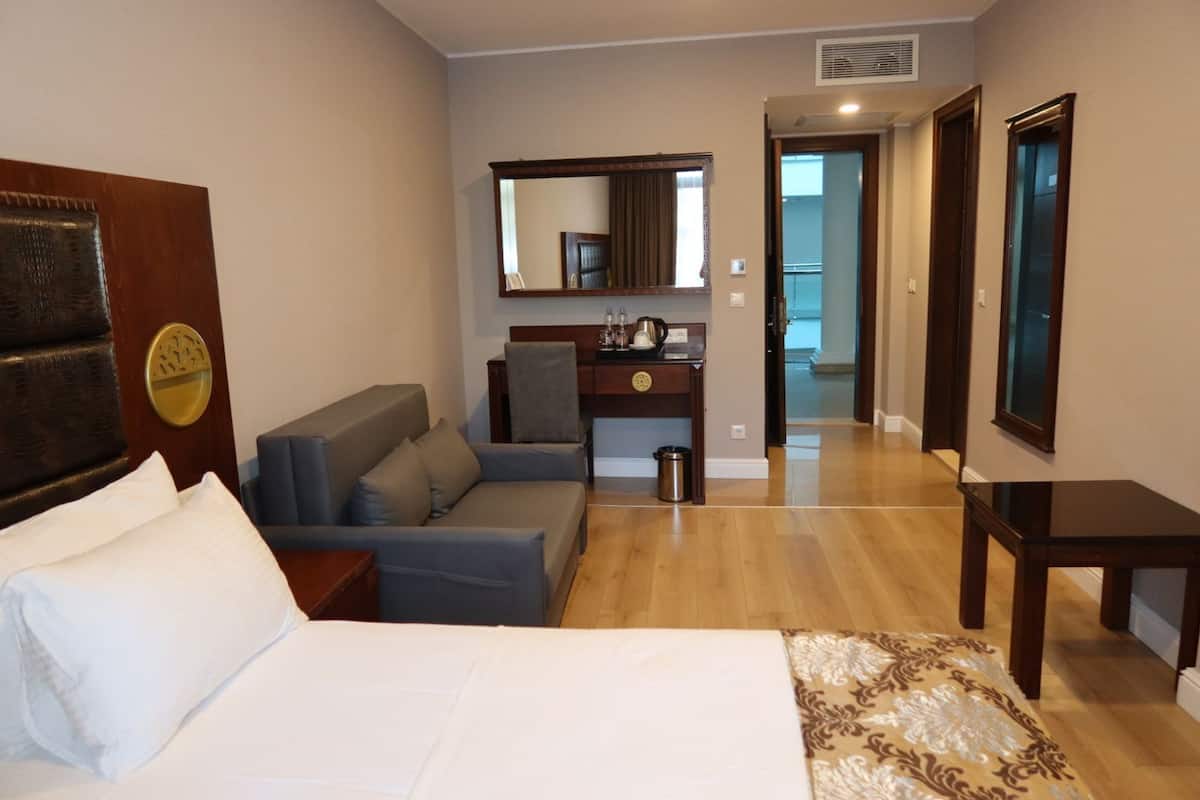 Premium Room | 1 bedroom, minibar, desk, laptop workspace