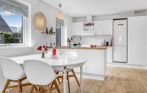 Fridge, stovetop, dishwasher, coffee/tea maker