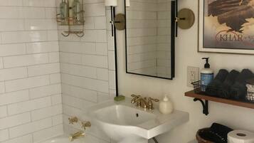 Combined shower/tub, hair dryer, towels, soap