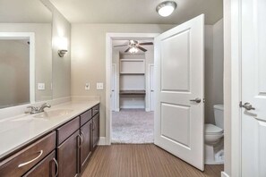 Bathtub, hair dryer, towels, soap