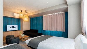 A modern hotel room with a large bed, a sofa, a TV, and a small table. - BON Kyoto Kiyomizu (Kyoto)