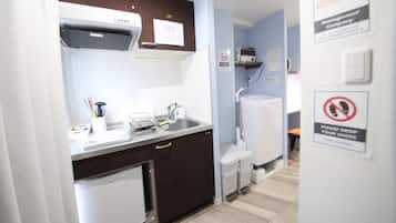 Fridge, microwave, electric kettle, cookware/dishes/utensils