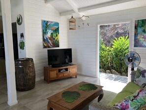 TV, books - Villa Kazami with pool and sea view (Vieux-Habitants)