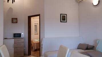 Appartamento | 1 camera, ferro/asse da stiro, Wi-Fi gratuito, lenzuola