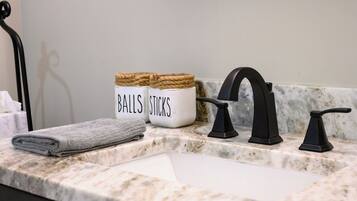 Combined shower/tub, hair dryer, towels, soap