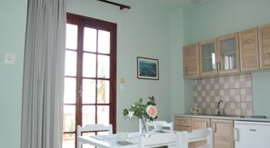 Mini-fridge, stovetop, cookware/dishes/utensils