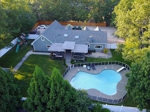 Outdoor pool, a heated pool - Villa Luz Family Home w/ heated pool & jacuzzi (Hampon Bays)