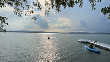On the beach, sun-loungers
