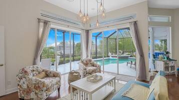 House, Multiple Beds (Waterfront home on key lot with pool ) | Living room