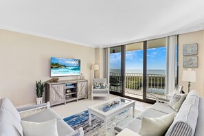 Condo, 1 King Bed with Sofa bed (Beachfront condo with pool, gym and t) | Living room