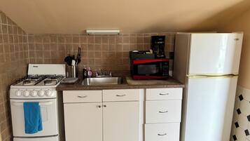 Fridge, microwave, coffee/tea maker, blender