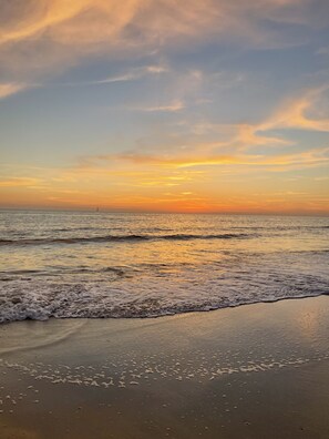 A beach with waves and a sunset. - Super Cute Beach House— our slice of heaven! (Port St. Joe, Florida)