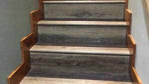 A staircase with wooden steps and wooden handrails. - Forest Estate Guest Quarters-Seclusion- Just Minutes from Town (Woodland Park)