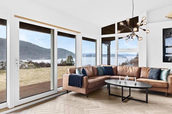 Cottage | Living area | 30-inch TV with digital channels - Modern Sleeps 14 w/ Panoramic Fjord-view, Petsok (Frogn)