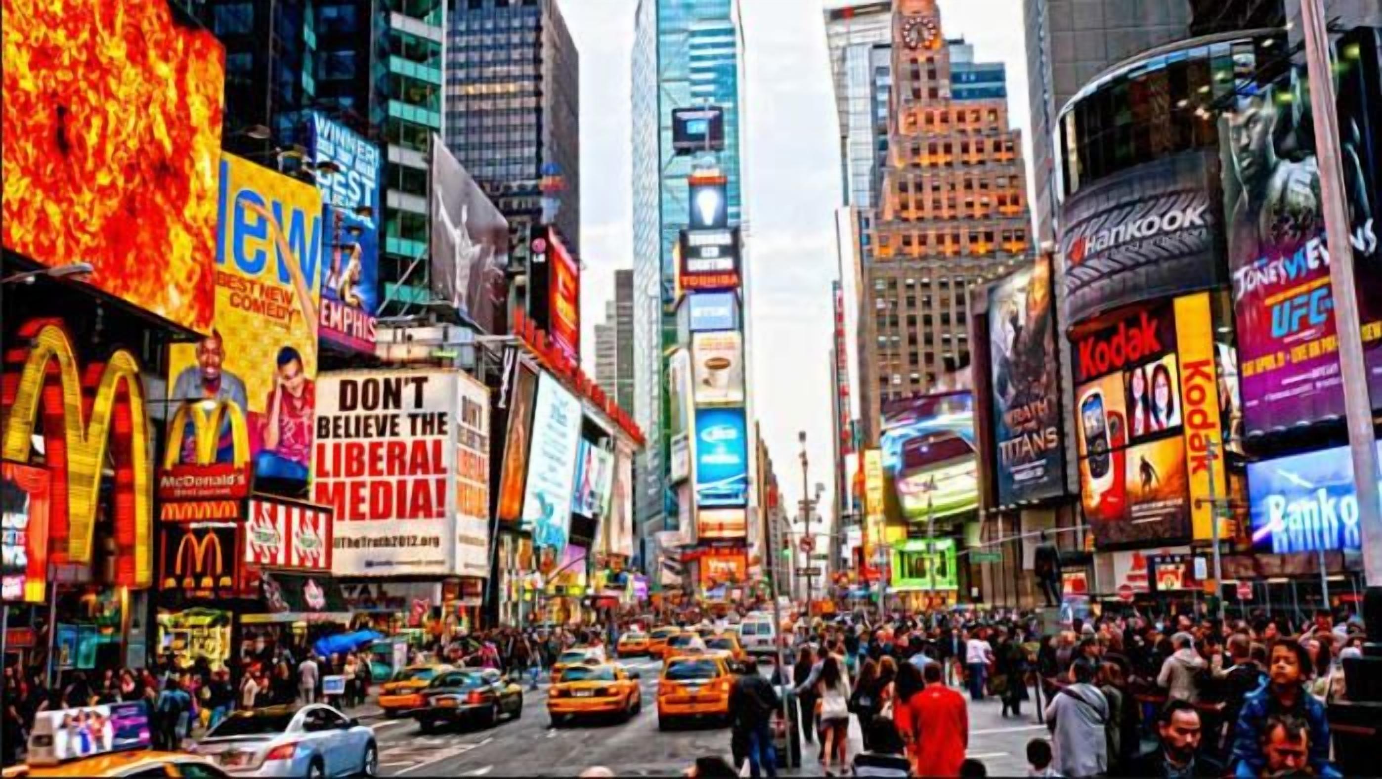 A busy urban street with tall buildings, billboards, and a crowd of people.