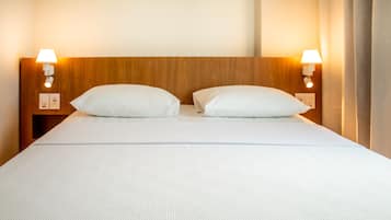 2 quartos, frigobar, cortinas blackout, Wi-Fi de cortesia