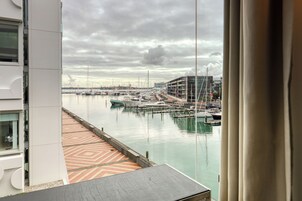 Deluxe King Room with Marina View | Egyptian cotton sheets, premium bedding, down comforters, pillowtop beds