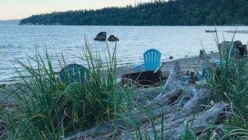 On the beach, sun loungers, beach towels