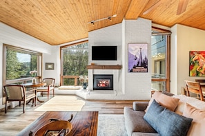 Flat-screen TV, fireplace - Dulany 406~Top-Floor Mountain Retreat~Steps from the Gondola! (Steamboat Springs)
