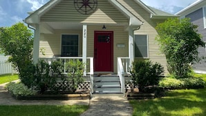 A house with a red door, a white porch, and a mailbox. - Eastside Modern Farmhouse in downtown Kalispell (Kalispell)