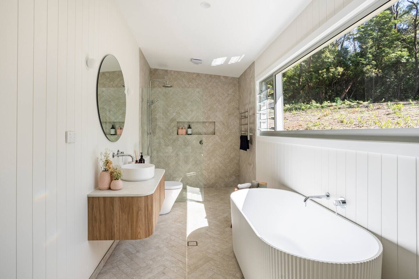 Bathtub, eco-friendly toiletries, hair dryer, towels