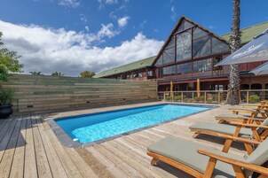Outdoor pool, pool umbrellas, sun loungers