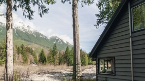 Property grounds - Riverside Mid-Century Cabin with Mountain Views (Baring)
