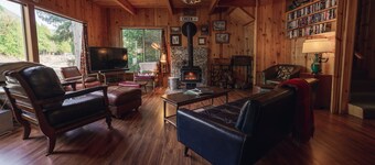 Riverside Mid-Century Cabin with Mountain Views