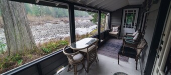 Riverside Mid-Century Cabin with Mountain Views