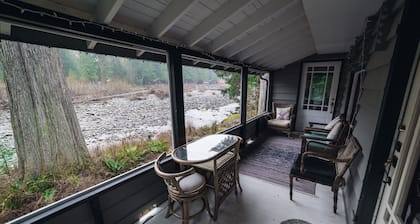 Riverside Mid-Century Cabin with Mountain Views