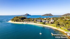 A coastal resort with beachfront properties, a marina, and a mountainous backdrop. - Albacore 6, 12-14 Ondine Close (Nelson Bay)