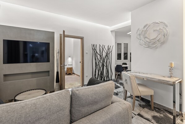 Suite Deluxe, 1 chambre, non-fumeur, bain à remous | Salle de séjour