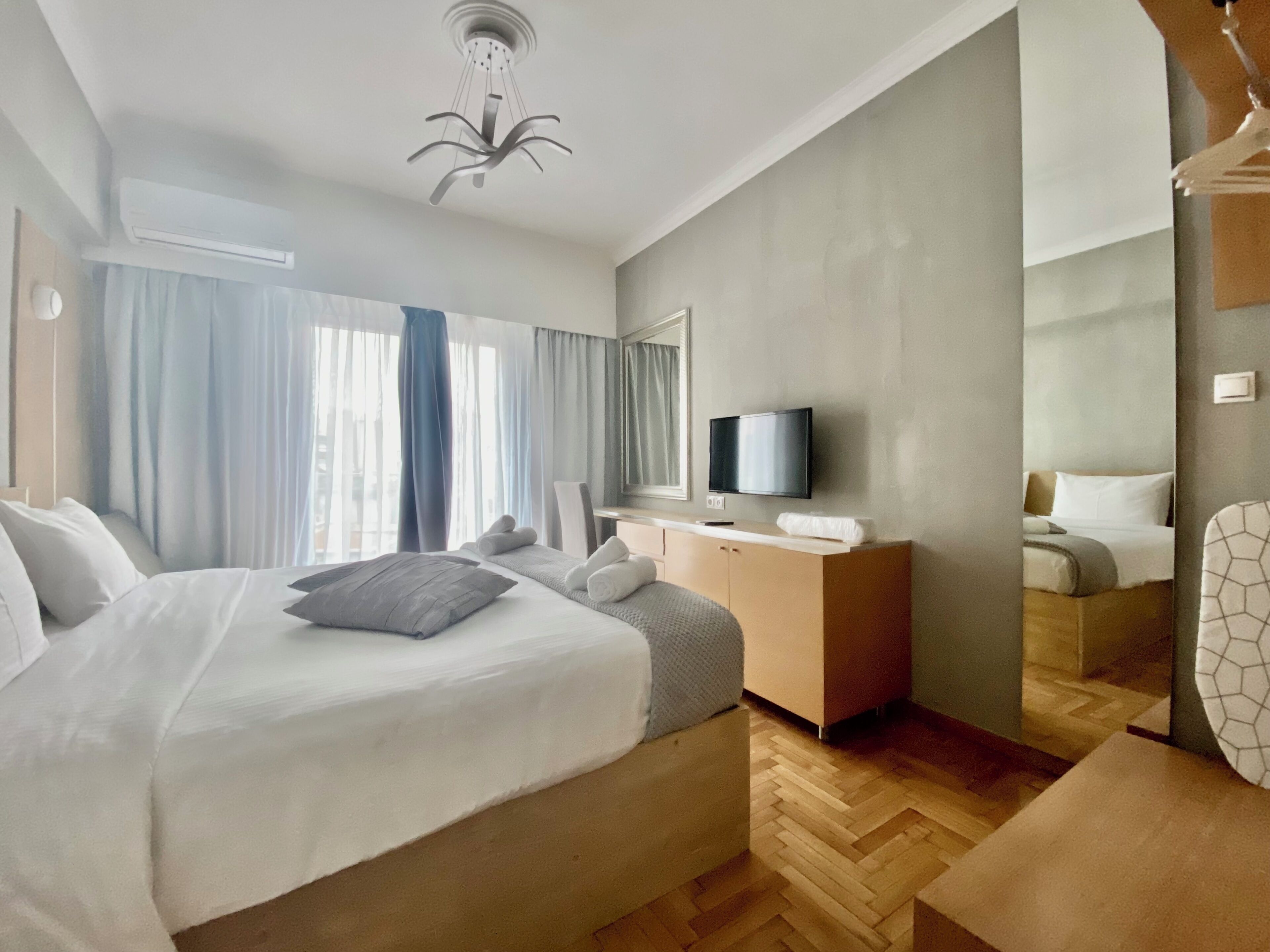 Deluxe Apartment, 2 Bedrooms, Non Smoking, City View | Egyptian cotton sheets, premium bedding, down duvets, memory-foam beds